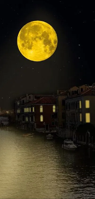 Moonlit Venice canal with illuminated buildings at night.