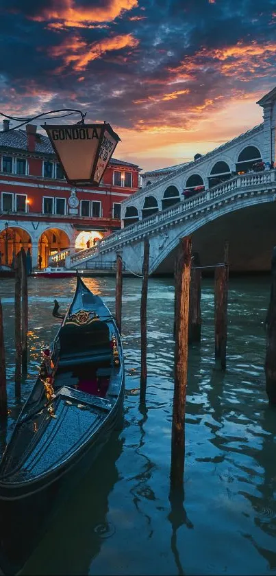 Gondola under a Venetian sunset with bridge in the background.