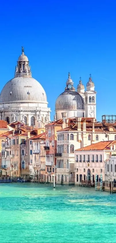 Venice cityscape with vibrant blue sky and iconic architecture.