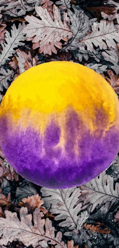 Abstract sphere in yellow and purple on autumn leaves background.