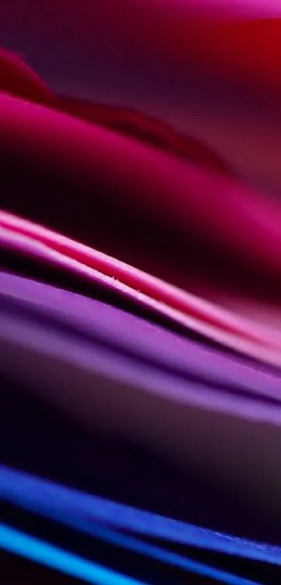 Vibrant abstract wallpaper with pink and purple layers.