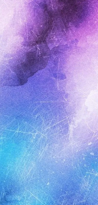 Vibrant abstract gradient wallpaper with purple and blue textures.