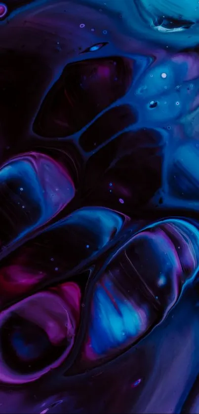 Vibrant abstract liquid wallpaper in blue and purple tones.