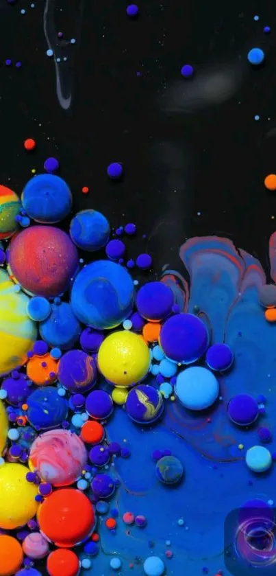 Vibrant abstract wallpaper with colorful spheres and a dark background.