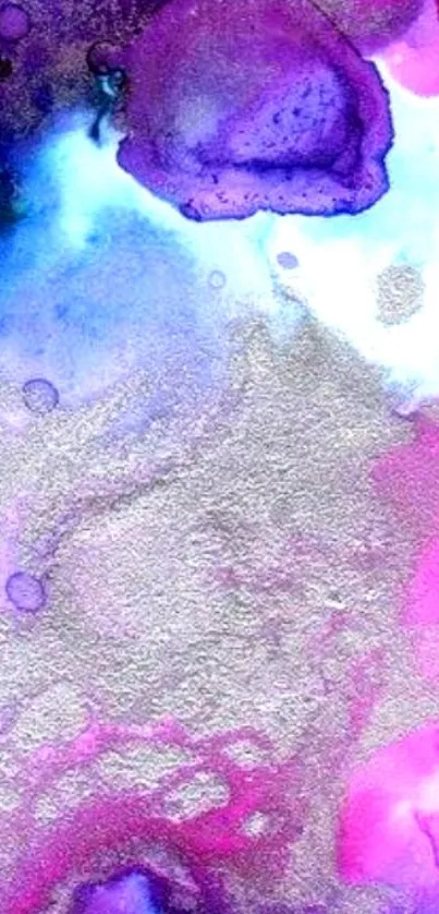 Vibrant abstract mobile wallpaper with pink, purple, and blue paint splashes.