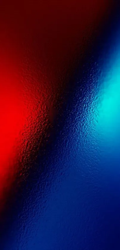 Vibrant abstract mobile wallpaper with red and blue gradients.