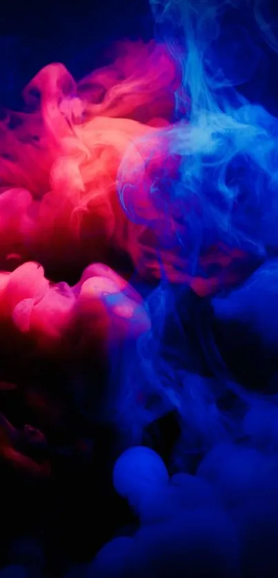 Vibrant abstract wallpaper with blue and red smoke swirling in darkness.