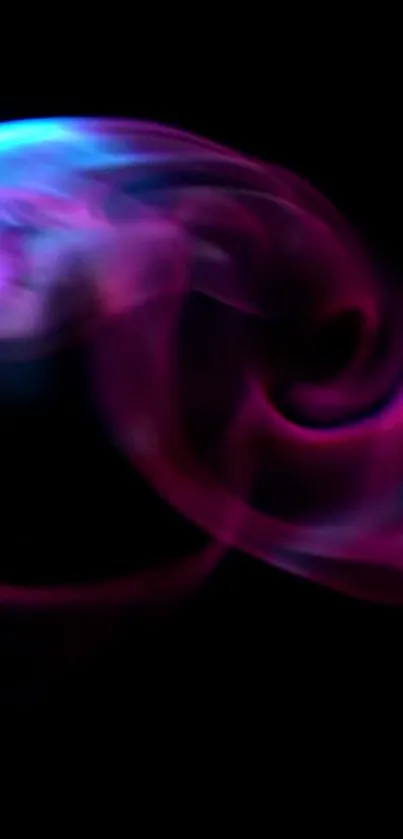 Vibrant abstract swirl with purple and blue hues on black background.