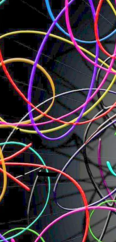 Vibrant abstract wire loops on black background wallpaper.