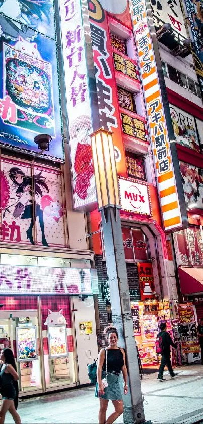 Vibrant Akihabara street with neon signs and people walking.