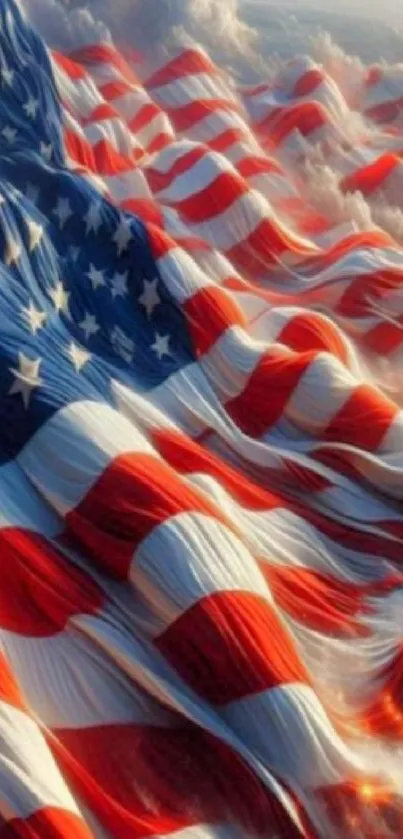 Vibrant mobile wallpaper of the American flag against a cloudy sky.