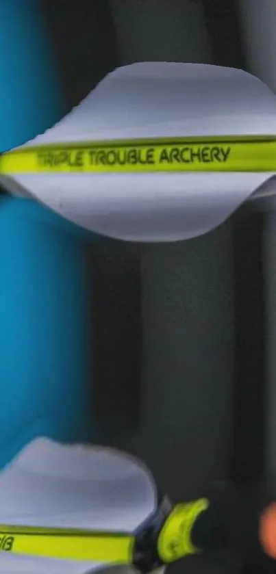 Archery arrows with neon yellow reflection on blue background.