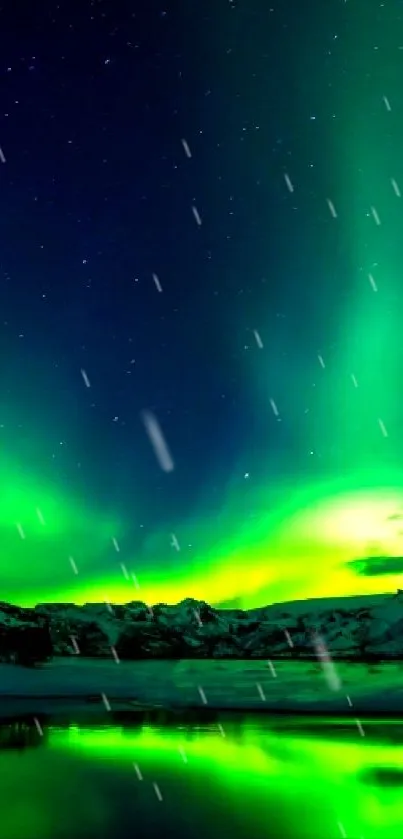 Vibrant green aurora borealis over snowy mountains and reflections.