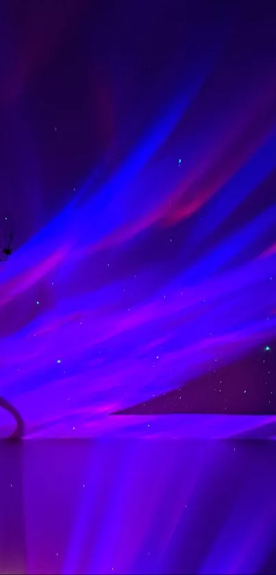 Mobile wallpaper with vibrant blue and purple aurora lights.