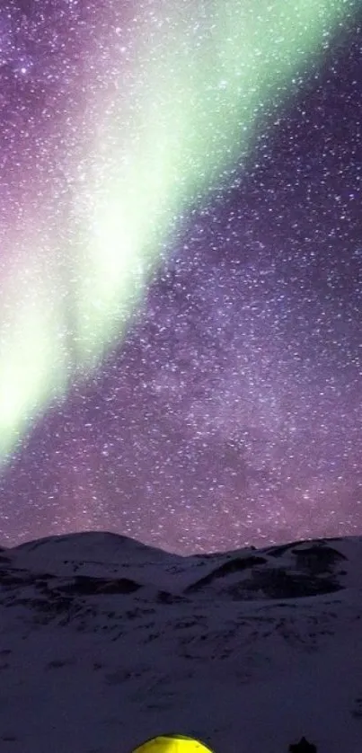 Mobile wallpaper of a vibrant aurora over a starry night sky with a tent below.