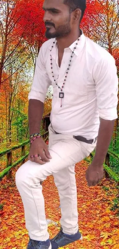 Man in white attire with vibrant autumn foliage background.