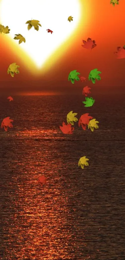 Autumn leaves with a vibrant sunset over the ocean.