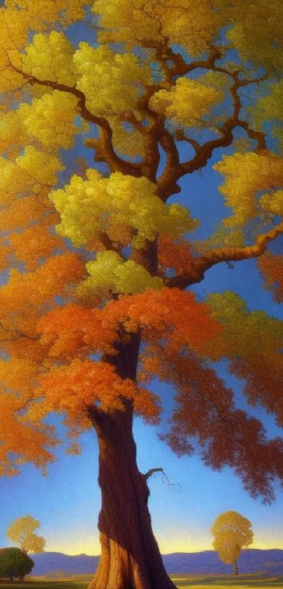 Vibrant autumn tree against a bright blue sky with colorful leaves.