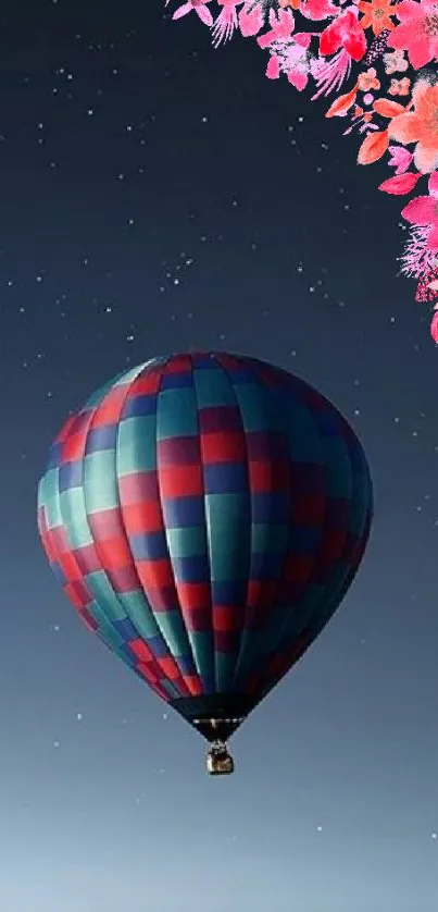 Hot air balloon against a starry sky with floral decorations.