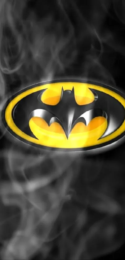 Batman logo with smoke effect on a dark background wallpaper.