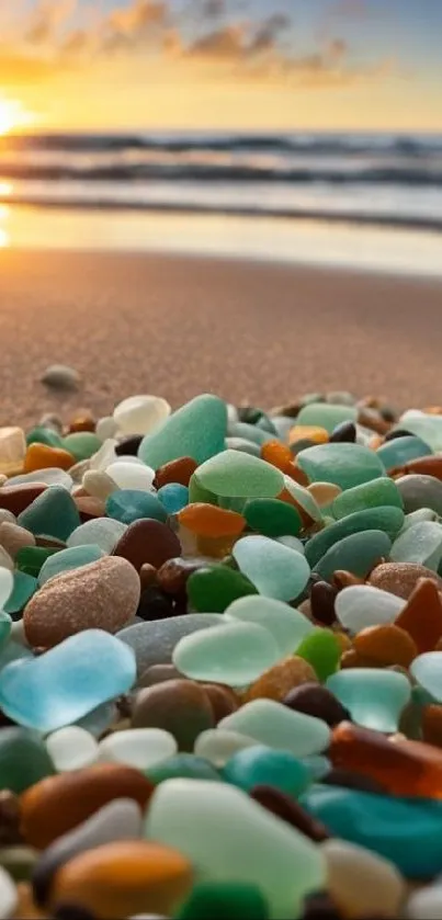 Colorful sea glass on a beach at sunset.