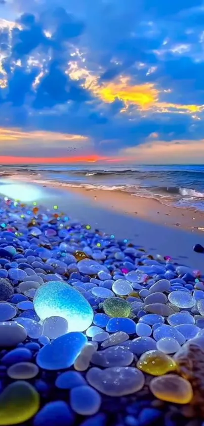 Colorful pebbles on beach under a vibrant blue sunset sky.