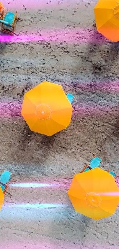 Aerial view of yellow beach umbrellas on sandy beach.