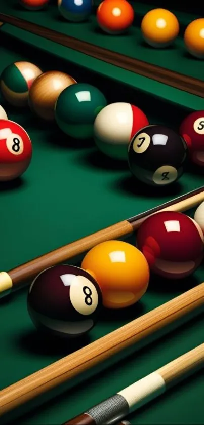 Vibrant billiards balls and cue sticks on a green table.