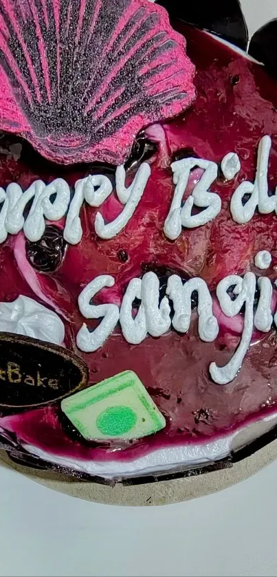 Festive birthday cake with pink icing and decorations.