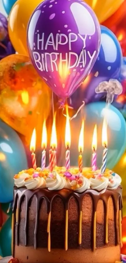 Festive birthday cake with colorful balloons and candles.