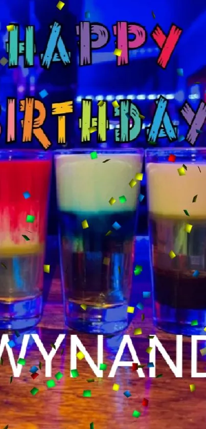 Colorful birthday drinks with blue neon light ambiance.