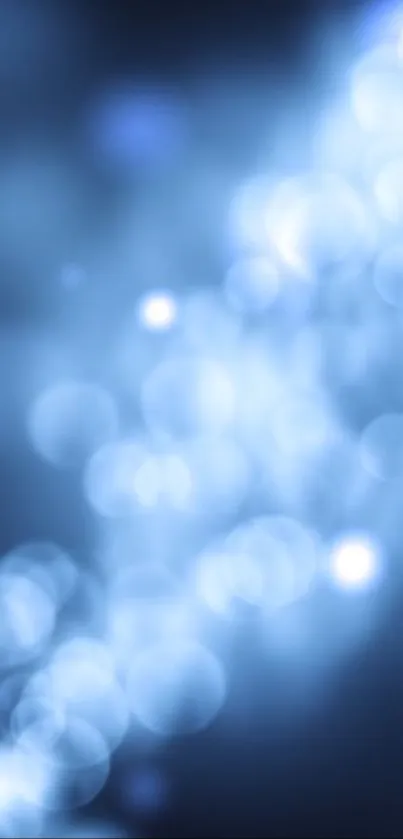 Blue bokeh abstract wallpaper with light patterns for mobile.