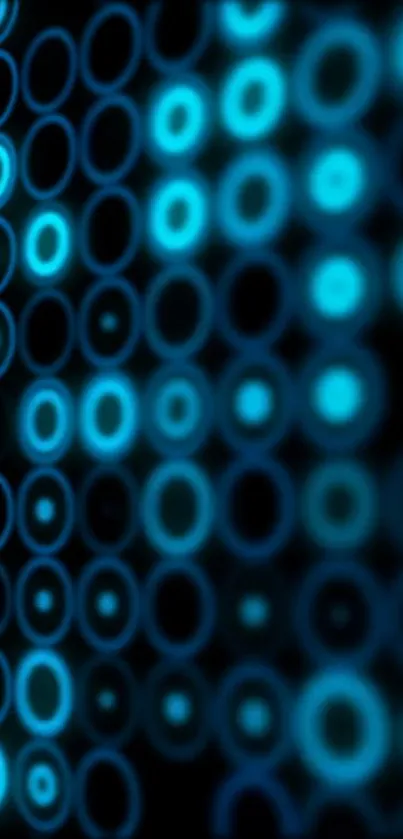 Abstract glowing blue circles on black background wallpaper.