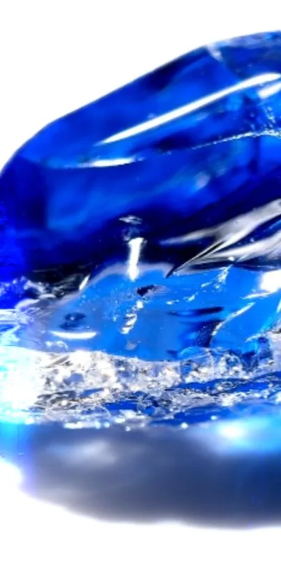 A vibrant blue crystal close-up on a smartphone wallpaper.