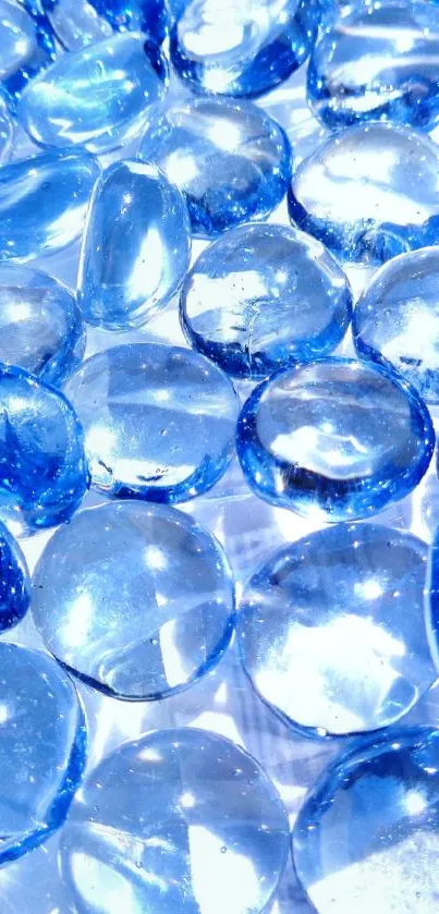 Vibrant blue crystal gems on a polished surface.