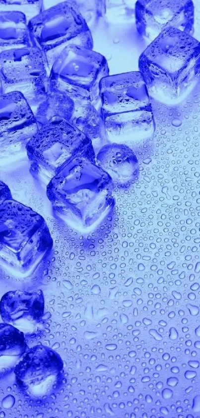 Vibrant blue ice cubes with droplets on a surface.