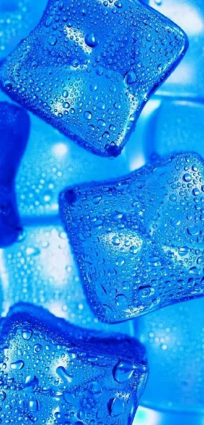 Vibrant blue ice cubes with water droplets on a glowing background.