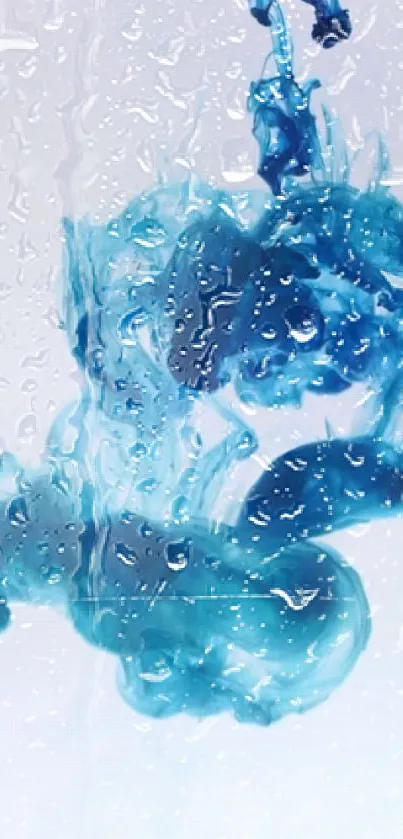 Mesmerizing blue ink swirling in water wallpaper.