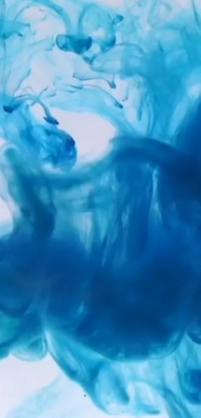 Vibrant blue ink swirling in water with an artistic fluid design.