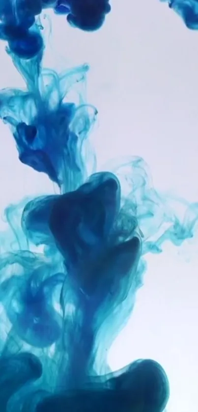 Captivating blue ink swirling in water, creating an artistic mobile wallpaper design.