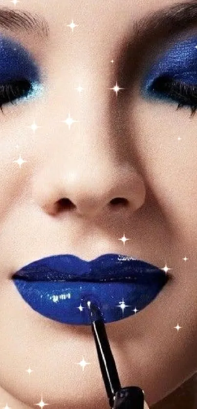 Close-up of vibrant blue makeup art on face.