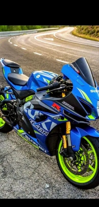 Vibrant blue sport motorcycle on a curvy road.