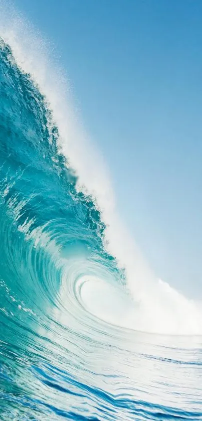 Vibrant blue ocean wave with clear skies.