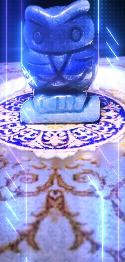 Blue owl statue with neon lights and ornate rug pattern.