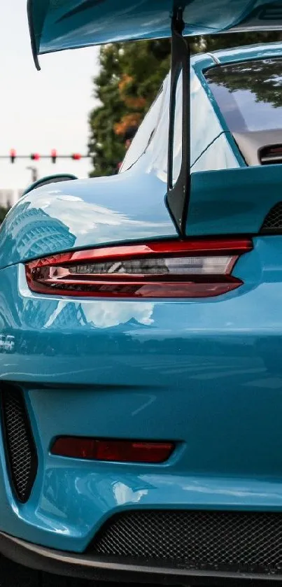 Vibrant blue sports car on an urban street, showcasing dynamic city life.