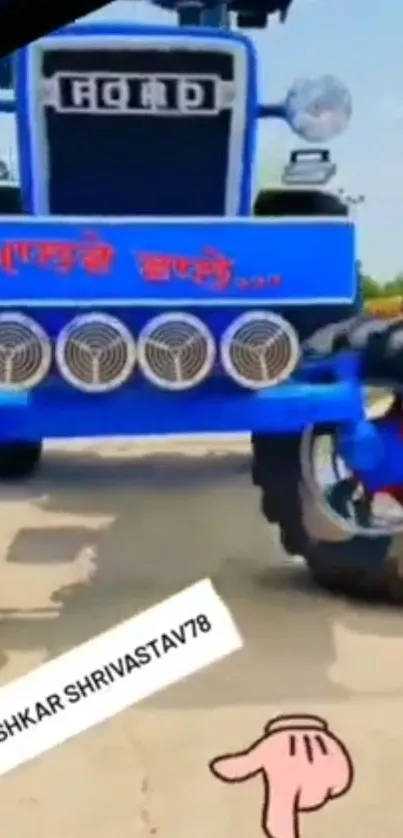 Front view of a vibrant blue tractor with large wheels.