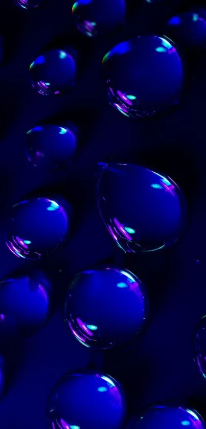 Vibrant dark blue wallpaper with glowing water drops.