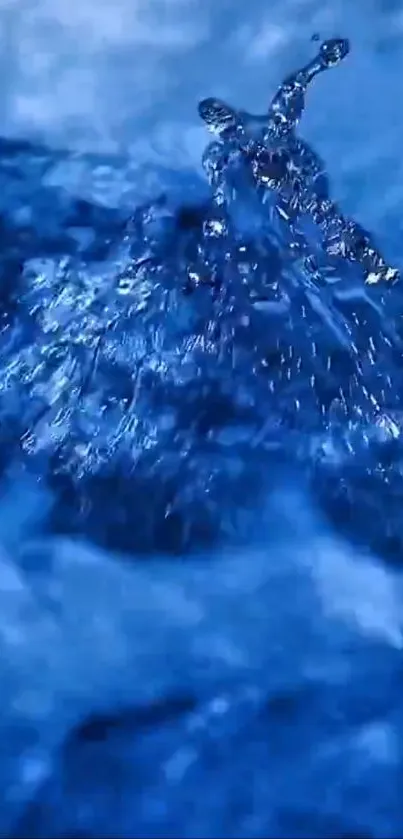 Blue water splash in dynamic motion.