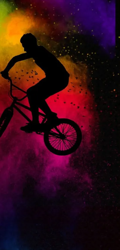 BMX rider silhouette on vibrant colorful background wallpaper.