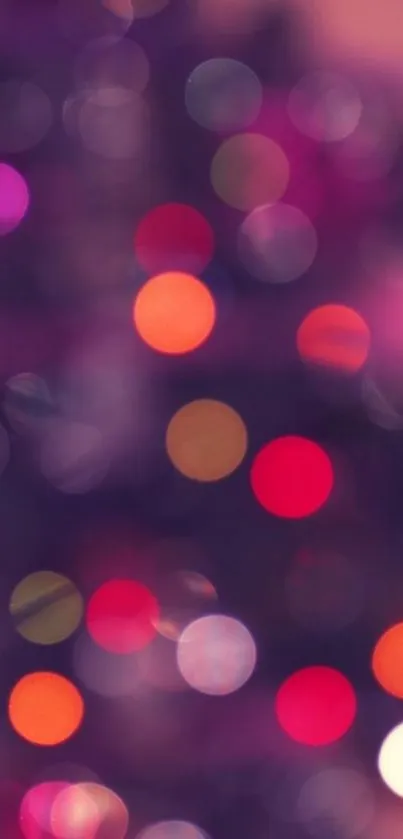 Colorful bokeh circle mobile wallpaper in pink and purple hues.